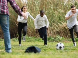 A boost for good causes Kids playing football