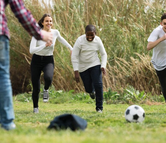 A boost for good causes Kids playing football
