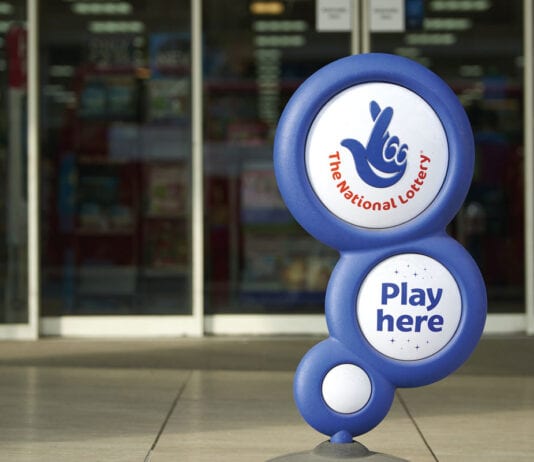 Camelot launches lottery legal challenge National Lottery sign