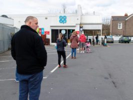 Store visits on the rise Queue at co-op store