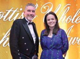 Grants for wholesale Finance Secretary Kate Forbes with Colin Smith of the SWA