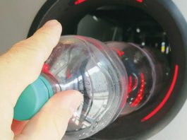 DRS gets an IT provider A bottle is input into a DRS machine