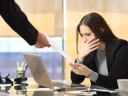 Fire and rehire is risky business woman receiving notice at work