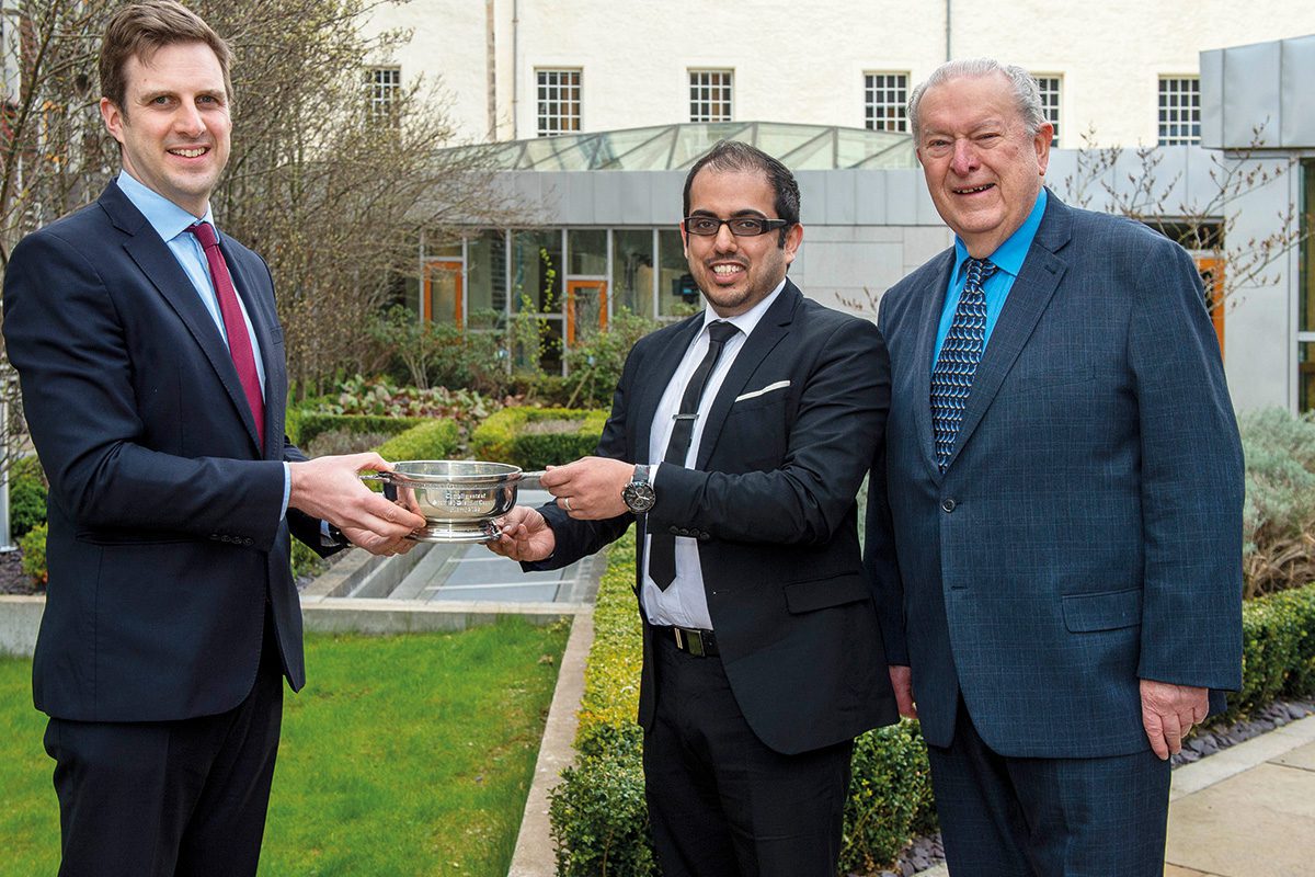 Outgoing Scottish president Ferhan Ashiq presented Johnson with the award.