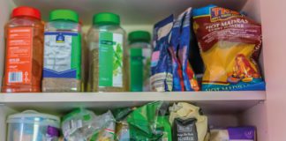 Food supplies in cupboard