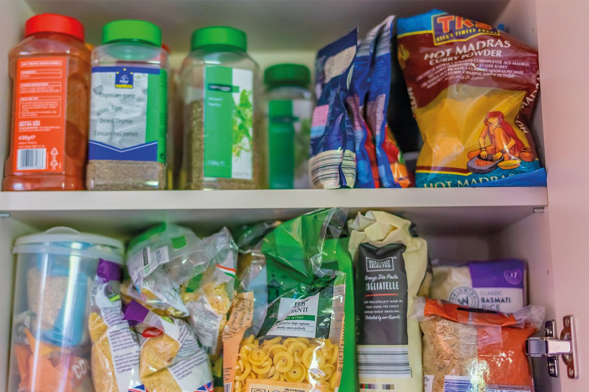 Food supplies in cupboard