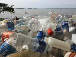 Inflation harming efforts plastic bottles on the beach