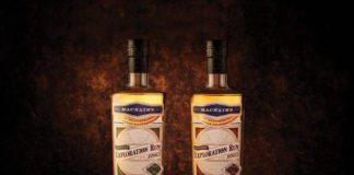 Two bottles of Exploration Jamaican Rum