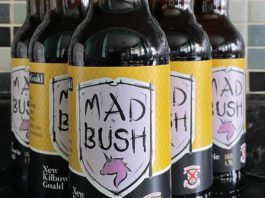 A Clydebank brew Bottles of Mad Bush lager showing label with clydebank fc logo