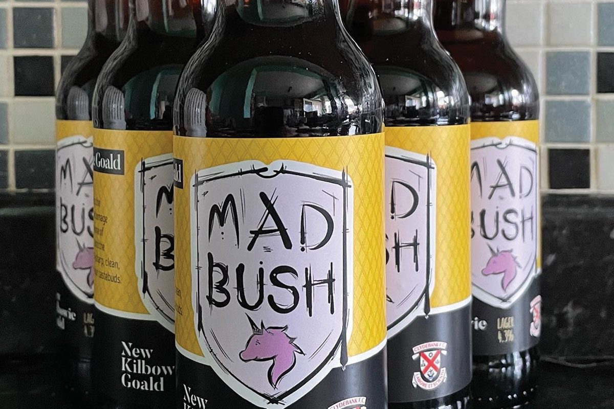 Bottles of Mad Bush lager showing label with clydebank fc logo