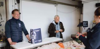 Monica Galetti selling lobster from a seafood counter