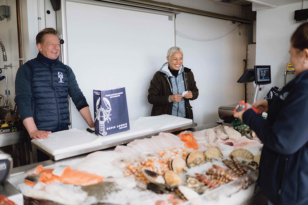 Monica Galetti selling lobster from a seafood counter