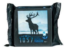 Maturing in the market Packaging of 1057 scottish cheddar cheese with stag illustration