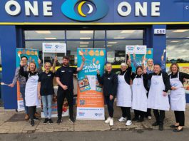Initiative is one healthy message Staff at one o one convenience store stand outside a shop with aprons on