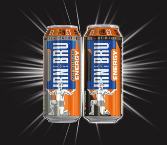 Irn-Bru Energy free stock Two irn bru energy drink cans on a black background
