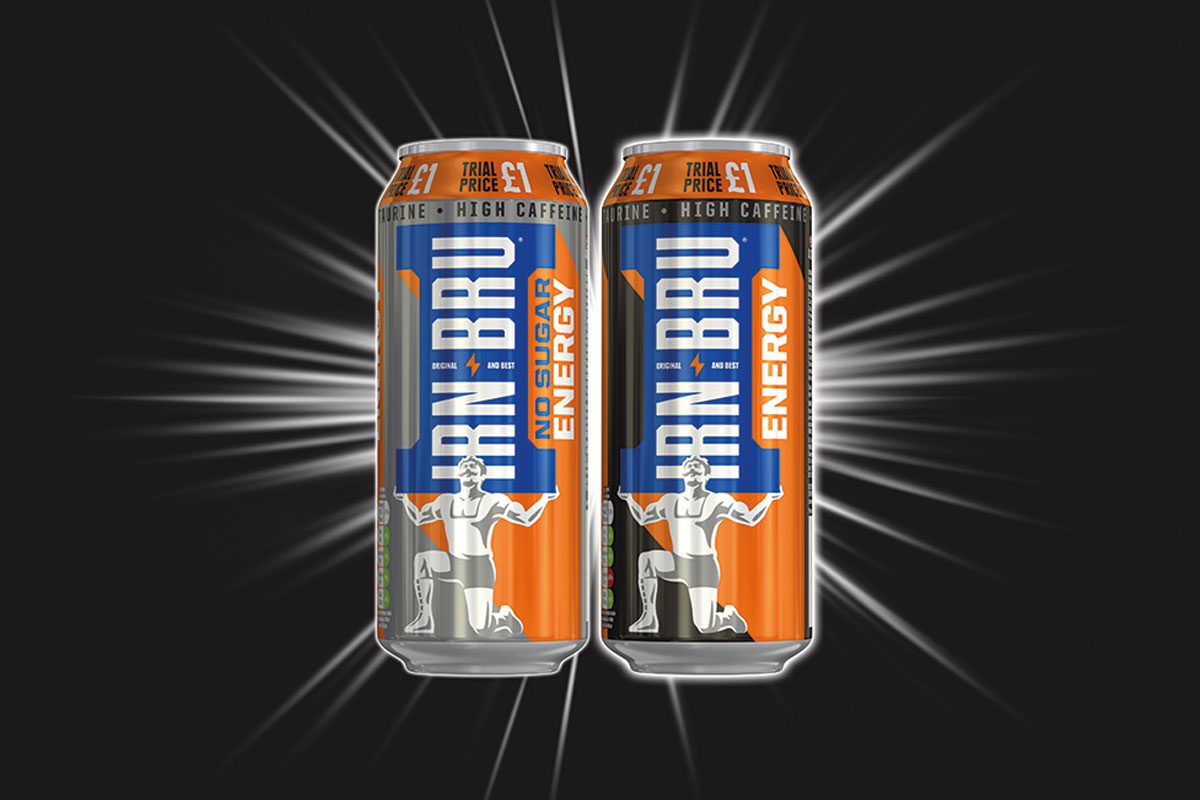 Two irn bru energy drink cans on a black background