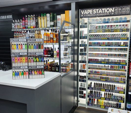 Vape consumers switching to disposable pod systems photograph of a vape retailer shop display