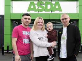 Baby saved in Asda Edinburgh store Parents hold their baby outside an ASDA store