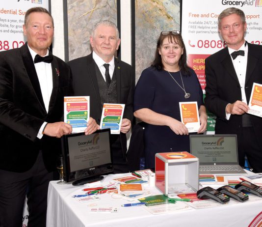 GroceryAid aims to grow charity in 2023 Grocery Aid staff charity auction