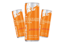 Image shows cans of apricot and strawberry flavour Red Bull energy drink