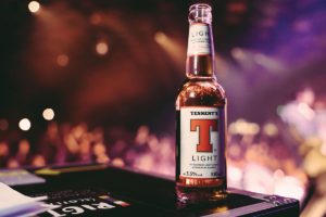 a bottle of tennents light beer