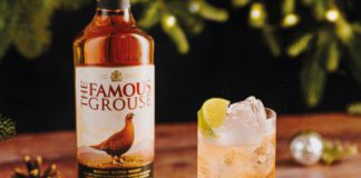 a bottle of the famous grouse whisky with a whisky cocktail