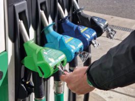 Getting a grip on illnesses person reading for petrol pump