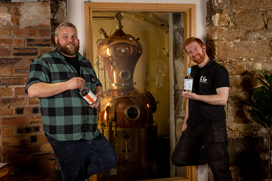 Edinburgh Gin distillers stand with the new bottles in the Experimental Series.