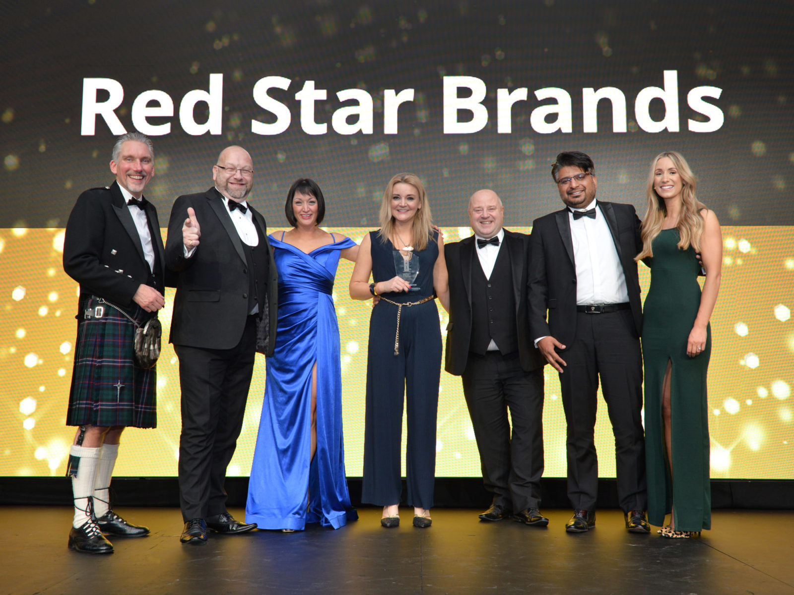 Red Star Brands accept the Project Wholesale gong at the Scottish Wholesale Achievers Awards 