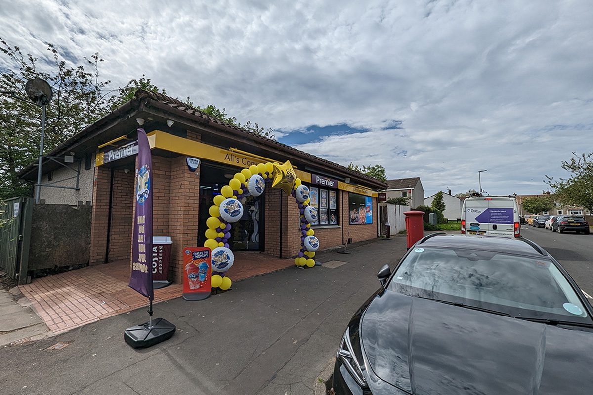 New Ali's Convenience Store in Tranent celebrating its opening with a balloon arch marking the opening as the 500th Premier shop in Scotland.