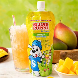 Slush Puppie Mango frozen drink with glass serve and mangoes