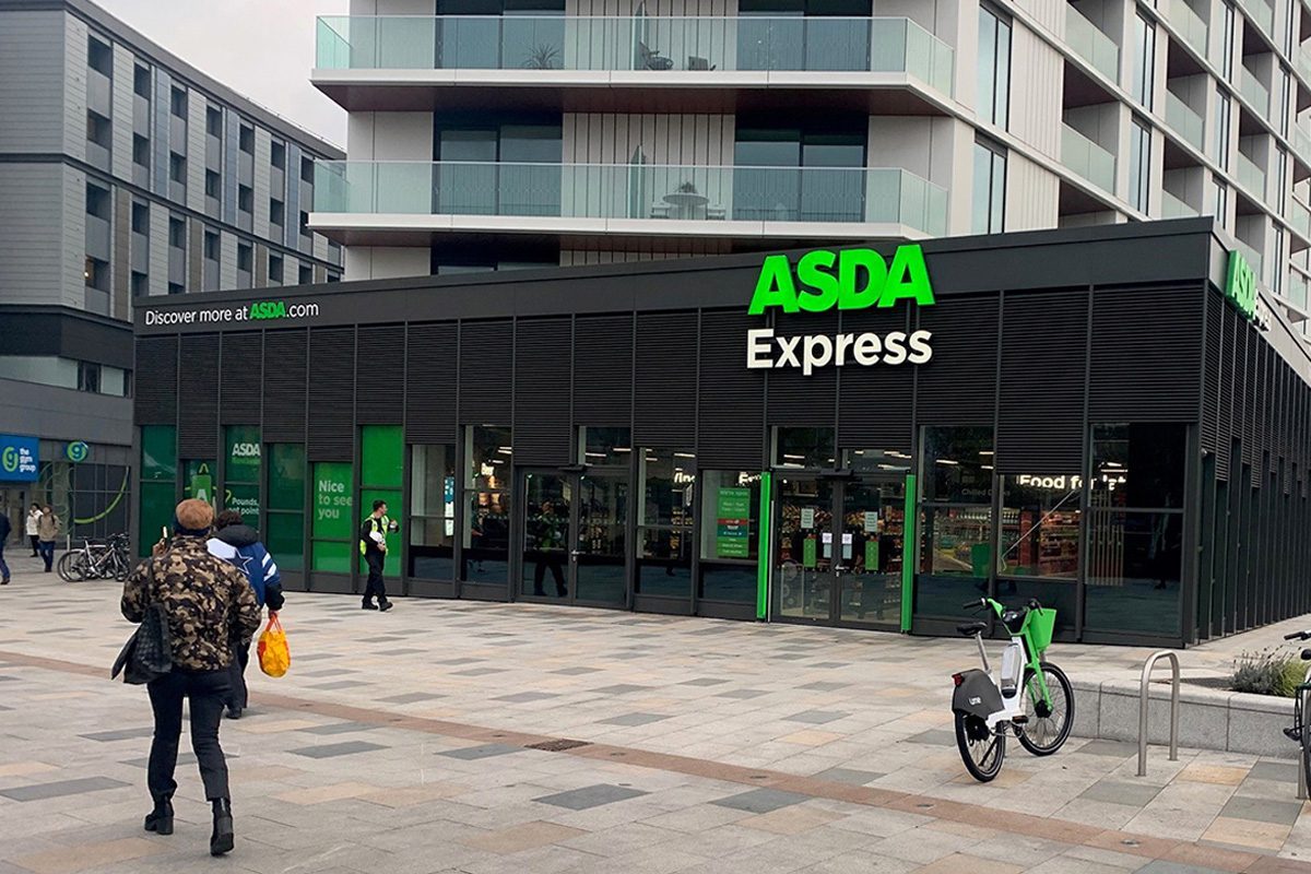 Image of the Asda Tottenham-Hale store with people walking in front of the store.