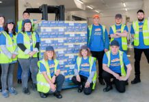 Martina Stocchi, of Lactalis, and FareShare's Clare O'Keeffe with Galloway Cheddar staff.