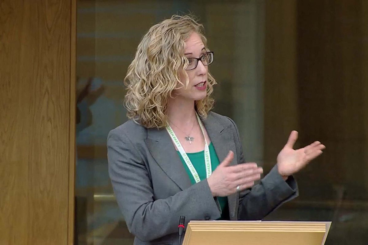 Circularity minister Lorna Slater stands in Scottish Parliament delivering a speech.
