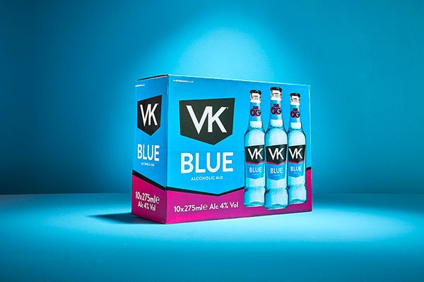 New 10 pack of VK Blue sits against a neon blue background with a spotlight on the pack.