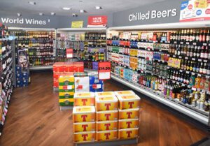 Alcohol section of the store with a range of brands available across chiller spaces.