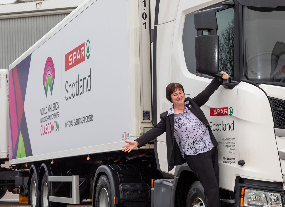Spar Scotland head of marketing Paula Middleton with one of the rebranded delivery trucks.