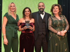 Awards Profile – The Innovation Award Shamly and Vikas Sud, whose GHSL Ltd business owns Premier RaceTrack Pitstop Bearsden, are congratulated by Laura McDermaid, of Philip Morris, and Scottish Grocer Awards host Elaine C Smith.