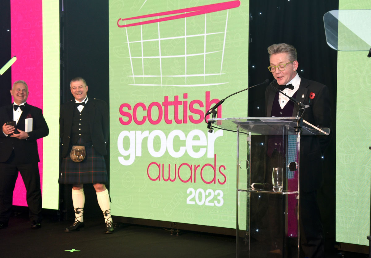 Graham Watson accepts the top Industry Achievement accolade at the Scottish Grocer Awards in 2023.