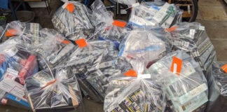 Bags that have a massive amount of counterfeit tobacco products in them from a store raid.