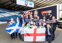 Former Scotland star Colin Hendry joined staff from CJ Lang and James Hall at Hampden to celebrate the WWEG campaign.
