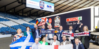 Former Scotland star Colin Hendry joined staff from CJ Lang and James Hall at Hampden to celebrate the WWEG campaign.