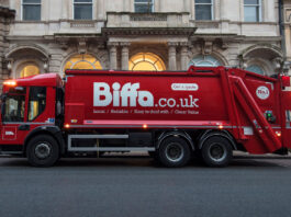 ScotGov faces £166million DRS court action A Biffa branded waste disposal truck is parked outside of a building.