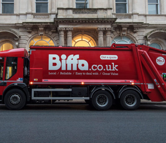 ScotGov faces £166m court case with Biffa over DRS failings A Biffa branded waste disposal truck is parked outside of a building.