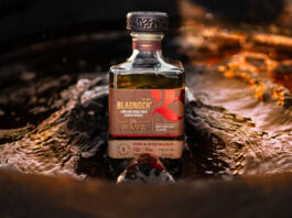 Bladnoch kicks off new whisky series with a Wave A bottle of Bladnoch The Wave whisky sits in the middle of a stream of water which parts around the bottle.