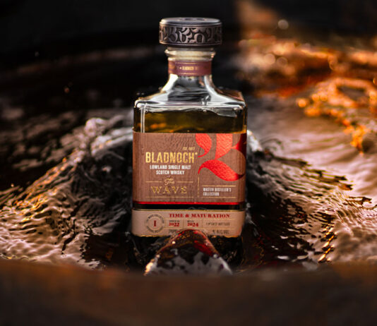 Bladnoch kicks off new whisky series with a Wave A bottle of Bladnoch The Wave whisky sits in the middle of a stream of water which parts around the bottle.