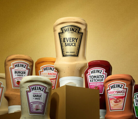 Heinz launches a saucy competition Bottles of Heinz sauce surround a single bottle of Heinz Saucy Sauce against a golden background.