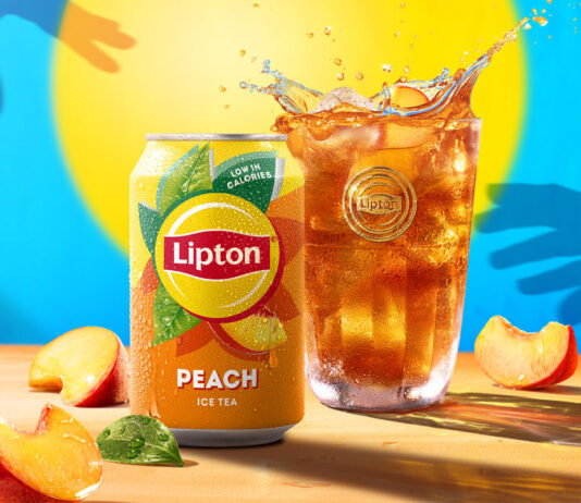 Win a year’s supply of stock of Lipton Iced Tea A can of Lipton Iced Tea sits next to a glass filled with the drink with peach pieces around them. There is also a blue background with yellow sun and silhouetted hands reaching for the drink.