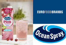 A carton of Ocean Spray Pink Cranberry sits next to a glass filled with the drink with logos for Euro Food Brands and Ocean Spray next to the image.