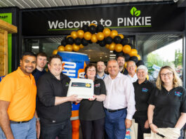 Pinkie Farm marks 10 year anniversary A group of people stand in the doorway of Spar Market Pinkie Farm Convenience to celebrate the store's 10th anniversary.